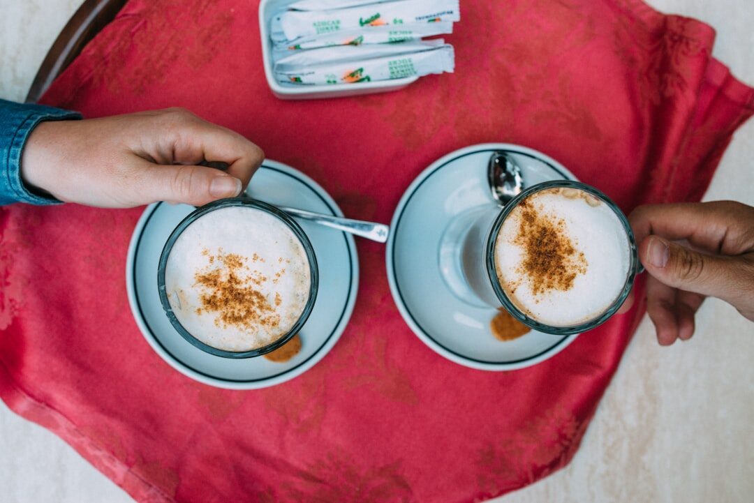person drinking coffee morning
